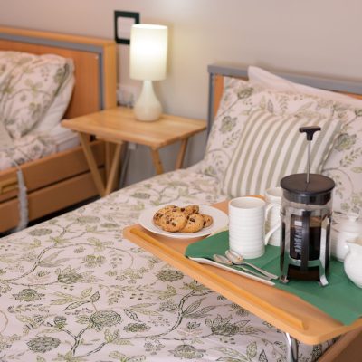 Bed tray with coffee and cups
